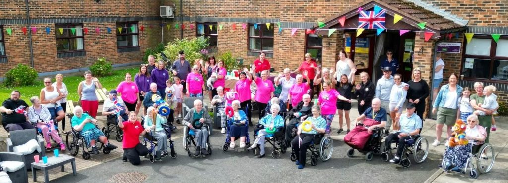 Residents and staff outside Hillside Lodge care home in Braeside